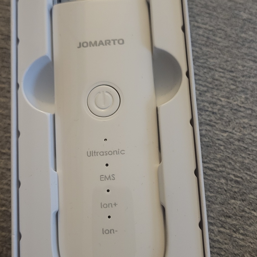 White Ultrasonic Facial Device